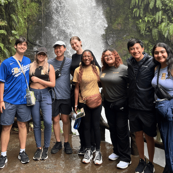 Moody Global fellows students in front of a waterfall